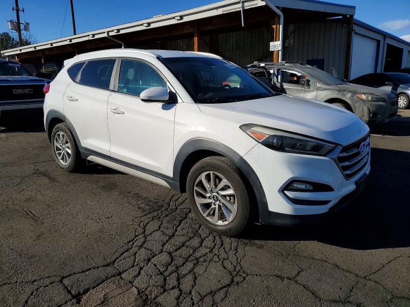 2018 Hyundai Tucson VIN KM8J3CA45JU614501 COPART salvage auction — MINOR DENT/SCRATCHES, Salvage Title, sold $2,050 on 2026-07-09 (photo 4)