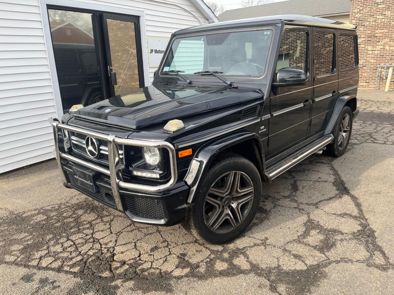 2017 Mercedes-benz G-class VIN WDCYC7DF6HX275774 COPART salvage auction — Minor Dent/Scratches, MA - CERTIFICATE OF TITLE (P), sold $47,000 on 2026-02-09 (photo 1)