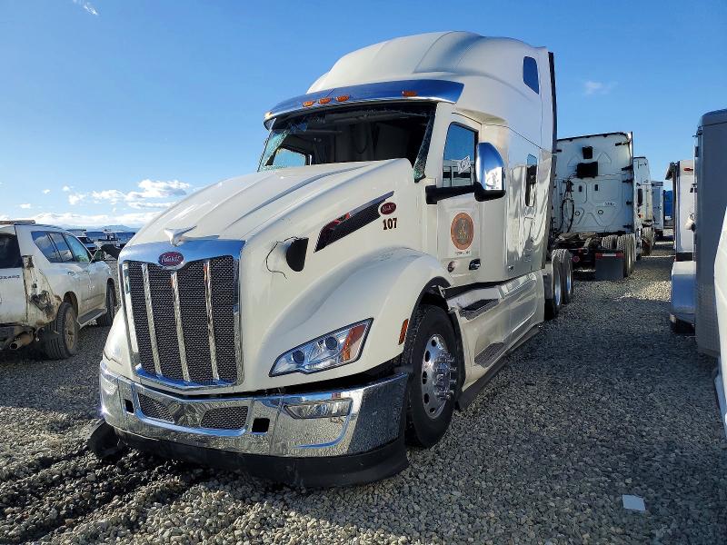 2023 Peterbilt - VIN 1XPBD49XXPD873079 COPART salvage auction — ROLLOVER, ID - SALVAGE CERTIFICATE OF TITLE, sold $6,800 on 2026-07-30 (photo 2)