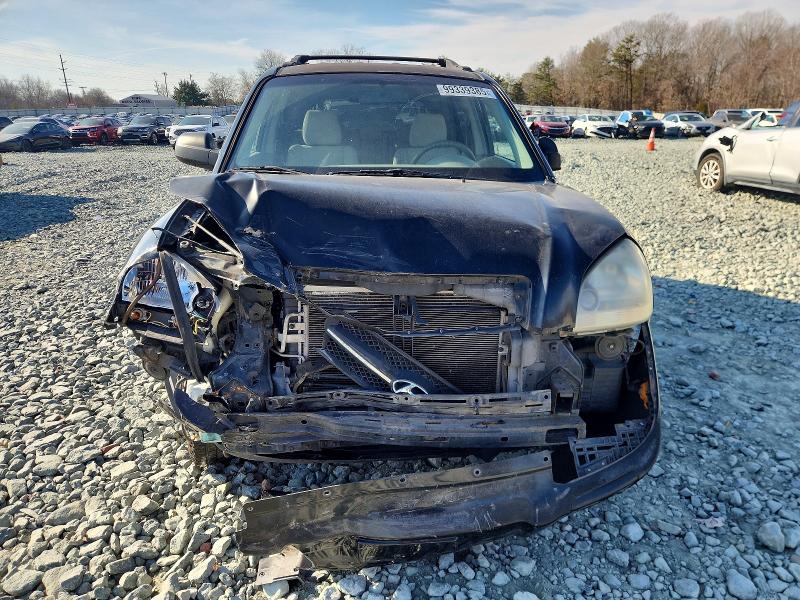 2005 Hyundai Tucson VIN KM8JM12B25U234262 COPART salvage auction — FRONT END, Nc - Salvage Certificate Of Title, sold $250 on 2026-07-08 (photo 5)