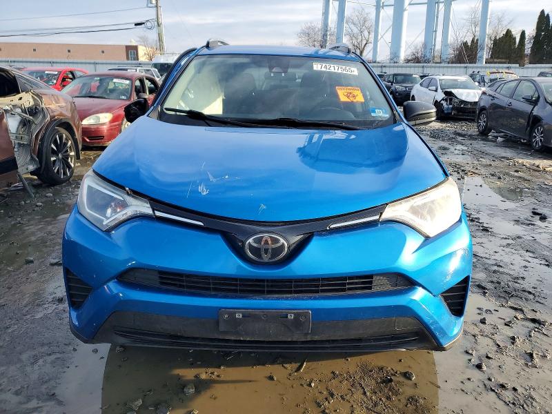 2018 Toyota Rav4 VIN JTMBFREV8JJ231630 COPART salvage auction — SIDE, Id - Salvage Certificate Of Title, sold $3,600 on 2026-07-13 (photo 5)