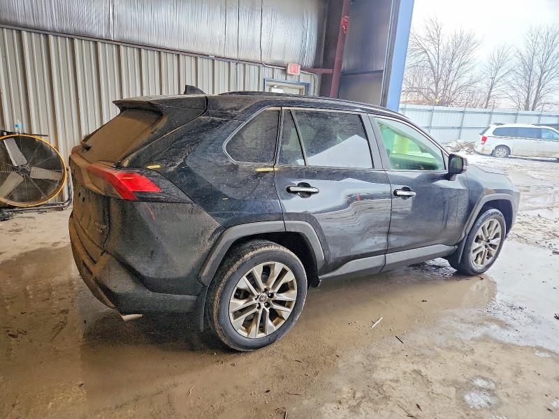 2023 Toyota Rav4 VIN JTMN1RFV1PD097710 COPART salvage auction — ROLLOVER, Mi - Cert Of Title-Salvage Vehicle, sold $9,500 on 2026-07-13 (photo 3)