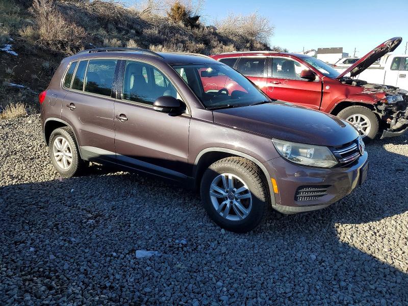 2016 Volkswagen Tiguan VIN WVGBV7AX3GW593869 COPART salvage auction — MINOR DENT/SCRATCHES, Nv - Certificate Of Title, sold $850 on 2026-07-23 (photo 4)