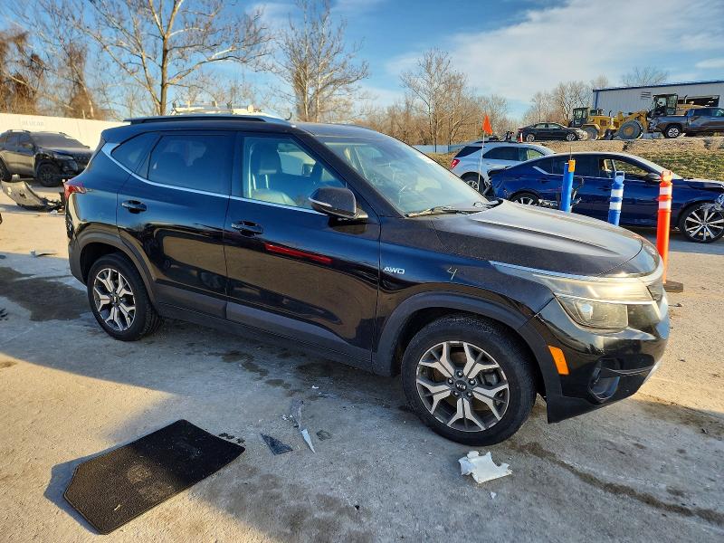 2021 Kia Seltos VIN KNDERCAA1M7217591 COPART salvage auction — SIDE, Mo - Salvage Certificate Of Title, sold $4,300 on 2026-07-14 (photo 4)