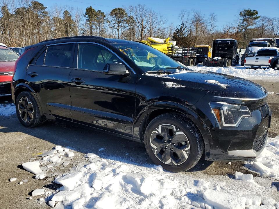 2023 Kia Niro VIN KNDCR3L15P5051273 COPART salvage auction — SIDE, Fl - Cert Of Title Slvg Rebuildable, sold $9,600 on 2026-07-06 (photo 4)