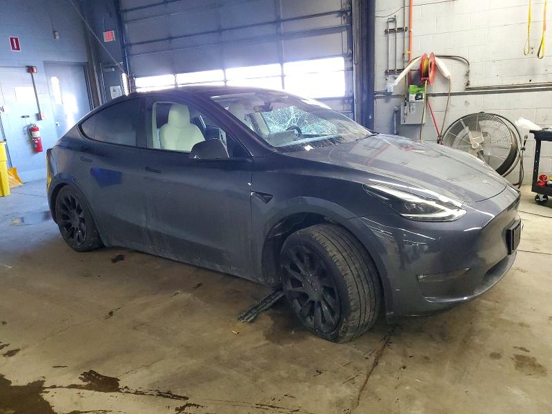 2023 Tesla Model y VIN 7SAYGAEE0PF967148 COPART salvage auction — SIDE, Il - Salvage Certificate, sold $9,200 on 2026-07-27 (photo 4)