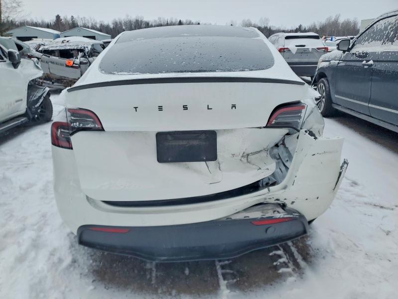 2022 Tesla Model y VIN 7SAYGDEF4NF515601 COPART salvage auction — REAR END, ON - PERMIT SALVAGE, sold $12,300 on 2026-07-16 (photo 6)