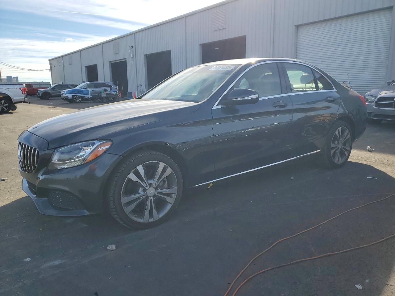 2015 Mercedes-Benz C-Class VIN 55SWF4KB4FU032554 — COPART salvage auction photo