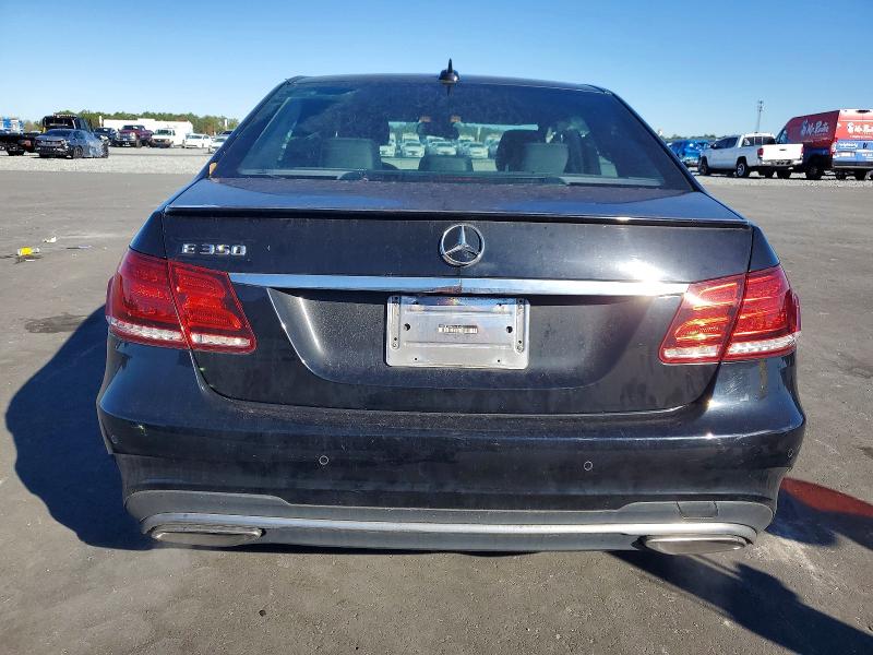 2014 Mercedes-benz E-klasse VIN WDDHF5KB8EA996829 COPART salvage auction — SIDE, Fl - Cert Of Title Slvg Rebuildable, sold $2,400 on 2026-07-13 (photo 6)