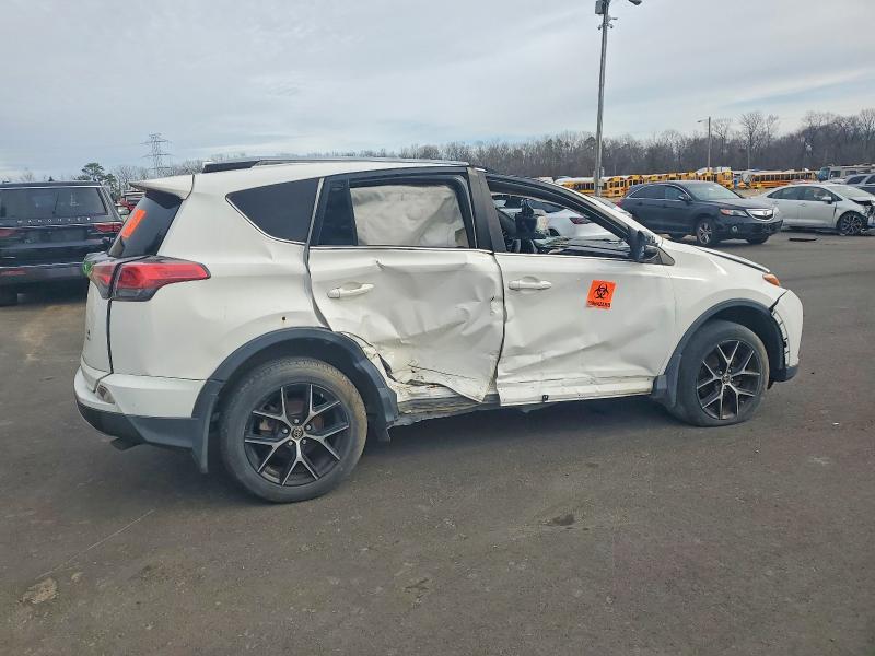 2018 Toyota Rav4 VIN JTMJFREV6JD238893 COPART salvage auction — ROLLOVER, In - Certificate Of Title, sold $2,700 on 2026-07-07 (photo 3)