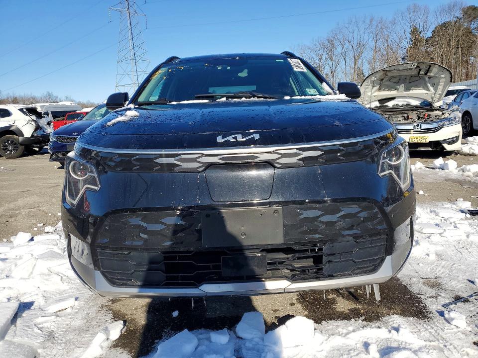 2023 Kia Niro VIN KNDCR3L15P5051273 COPART salvage auction — SIDE, Fl - Cert Of Title Slvg Rebuildable, sold $9,600 on 2026-07-06 (photo 5)