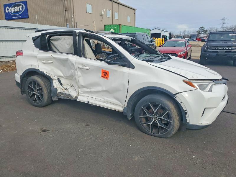 2018 Toyota Rav4 VIN JTMJFREV6JD238893 COPART salvage auction — ROLLOVER, In - Certificate Of Title, sold $2,700 on 2026-07-07 (photo 4)
