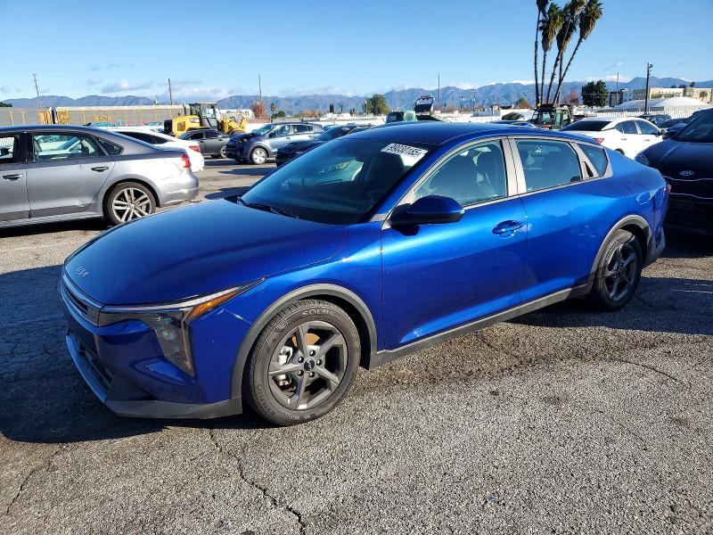 2025 Kia K4 VIN 3KPFT4DE0SE055220 COPART salvage auction — SIDE, Salvage Title, sold $5,800 on 2026-07-10 (photo 1)