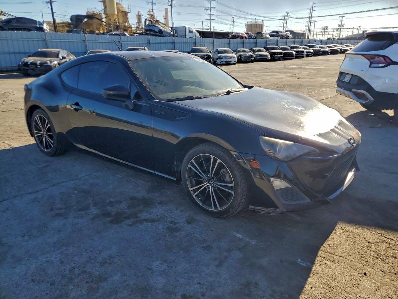 2013 Toyota VIN JF1ZNAA16D2714981 COPART salvage auction — MINOR DENT/SCRATCHES, Salvage Title, sold $2,200 on 2026-07-13 (photo 4)