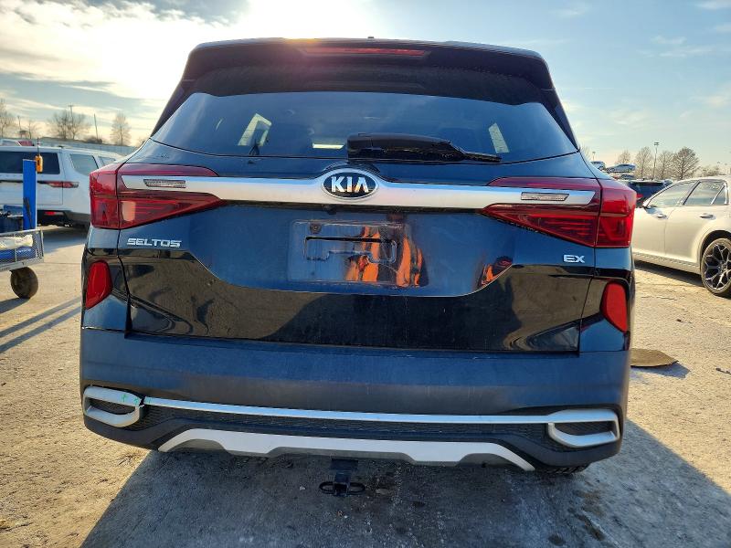 2021 Kia Seltos VIN KNDERCAA1M7217591 COPART salvage auction — SIDE, Mo - Salvage Certificate Of Title, sold $4,300 on 2026-07-14 (photo 6)
