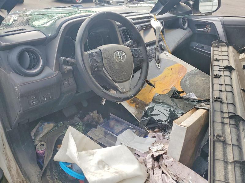 2018 Toyota Rav4 VIN JTMJFREV6JD238893 COPART salvage auction — ROLLOVER, In - Certificate Of Title, sold $2,700 on 2026-07-07 (photo 8)