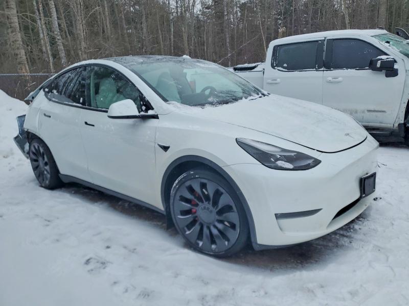 2022 Tesla Model y VIN 7SAYGDEF4NF515601 COPART salvage auction — REAR END, ON - PERMIT SALVAGE, sold $12,300 on 2026-07-16 (photo 4)