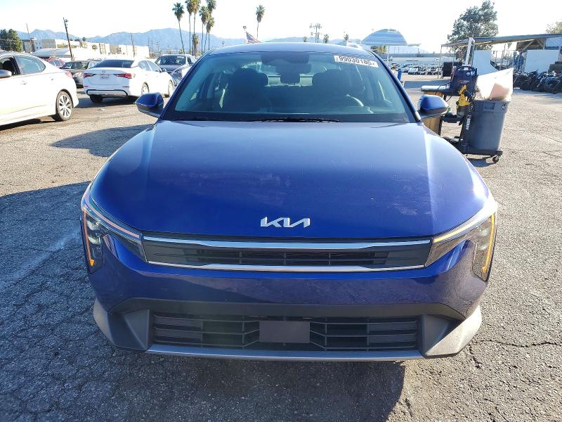 2025 Kia K4 VIN 3KPFT4DE0SE055220 COPART salvage auction — SIDE, Salvage Title, sold $5,800 on 2026-07-10 (photo 5)