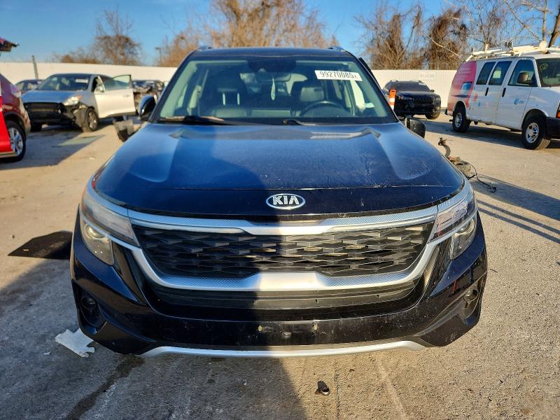 2021 Kia Seltos VIN KNDERCAA1M7217591 COPART salvage auction — SIDE, Mo - Salvage Certificate Of Title, sold $4,300 on 2026-07-14 (photo 5)