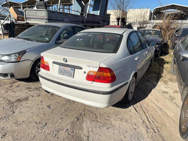 2002 BMW 3 series VIN WBAET374X2NG82236 COPART salvage auction — NORMAL WEAR, Tx - Storage Lien Papers, sold $100 on 2026-07-15 (photo 4)