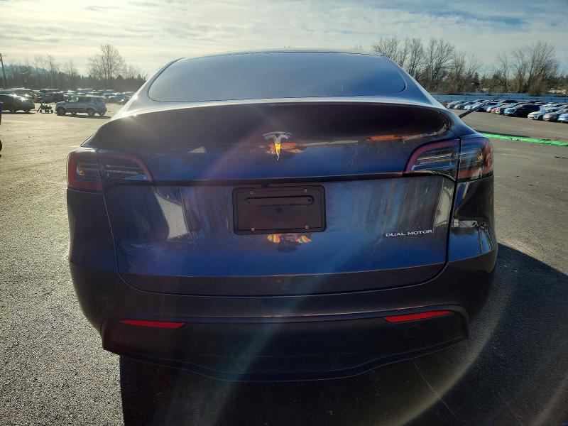 2023 Tesla Model y VIN 7SAYGAEE7PF771059 COPART salvage auction — FRONT END, Or - Salvage Title Certificate, sold $8,200 on 2026-07-22 (photo 6)