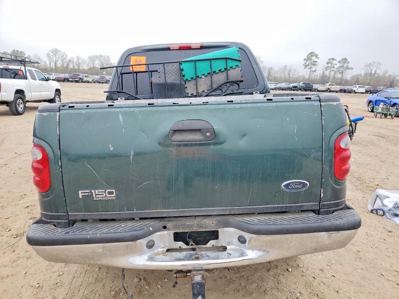2002 Ford F-150 VIN 1FTRW07L52KD06009 COPART salvage auction — FRONT END, TX - SALVAGE VEHICLE TITLE (P), sold $675 on 2026-07-02 (photo 6)