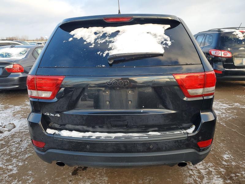 2013 Jeep Grand cherokee VIN 1C4RJFAT0DC583772 COPART salvage auction — NORMAL WEAR, Il - Certificate Of Title, sold $2,800 on 2026-07-21 (photo 6)