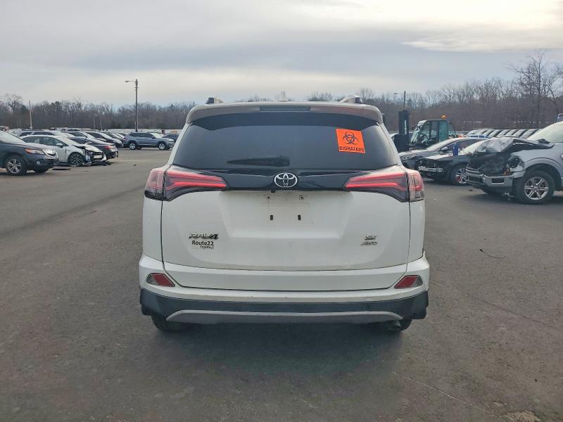 2018 Toyota Rav4 VIN JTMJFREV6JD238893 COPART salvage auction — ROLLOVER, In - Certificate Of Title, sold $2,700 on 2026-07-07 (photo 6)