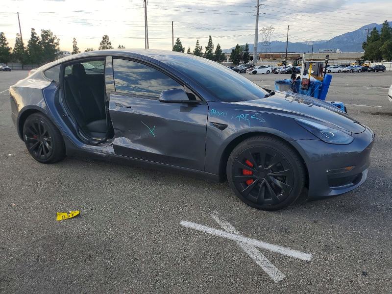 2023 Tesla Model 3 VIN 5YJ3E1EB6PF711079 COPART salvage auction — SIDE, Ca - Salvage Certificate, sold $6,700 on 2026-07-28 (photo 4)