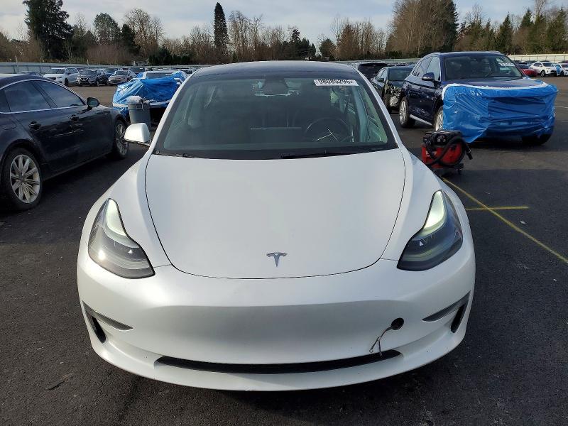2023 Tesla Model 3 VIN 5YJ3E1EA1PF455988 COPART salvage auction — SIDE, OR - LIEN PAPERS SALVAGE, sold $6,700 on 2026-07-20 (photo 5)