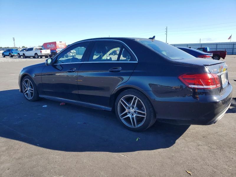 2014 Mercedes-benz E-klasse VIN WDDHF5KB8EA996829 COPART salvage auction — SIDE, Fl - Cert Of Title Slvg Rebuildable, sold $2,400 on 2026-07-13 (photo 2)