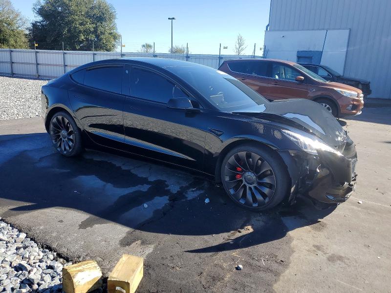 2022 Tesla Model 3 VIN 5YJ3E1EC6NF195974 COPART salvage auction — FRONT END, Fl - Cert Of Title Slvg Rebuildable, sold $10,400 on 2026-07-20 (photo 4)