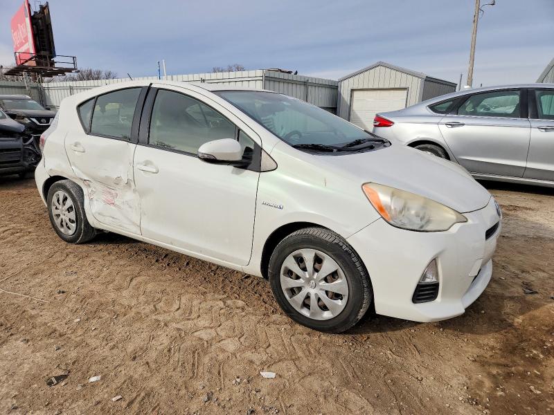 2013 Toyota Prius c VIN JTDKDTB33D1543896 COPART salvage auction — SIDE, Ks - Cert Of Title-Salvage, sold $225 on 2026-07-27 (photo 4)