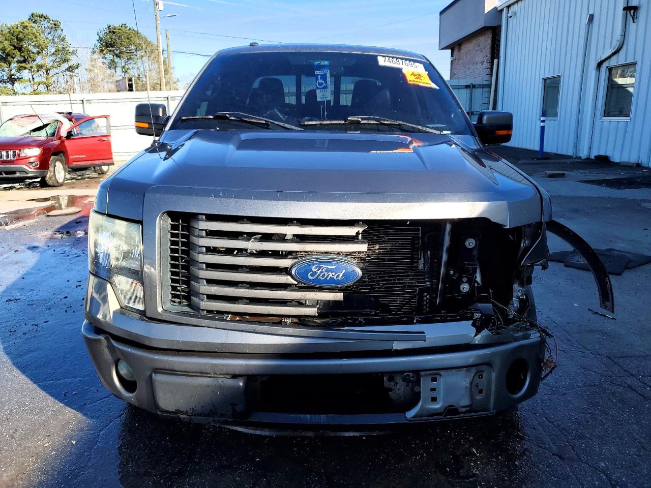 2011 Ford F-150 Lightning VIN 1FTFW1CT3BKE14241 COPART salvage auction — Front End, AL - CERT OF TITLE-SALVAGE TITLE, sold $1,600 on 2026-06-25 (photo 5)
