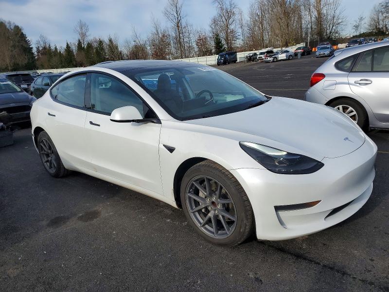 2023 Tesla Model 3 VIN 5YJ3E1EA1PF455988 COPART salvage auction — SIDE, OR - LIEN PAPERS SALVAGE, sold $6,700 on 2026-07-20 (photo 4)