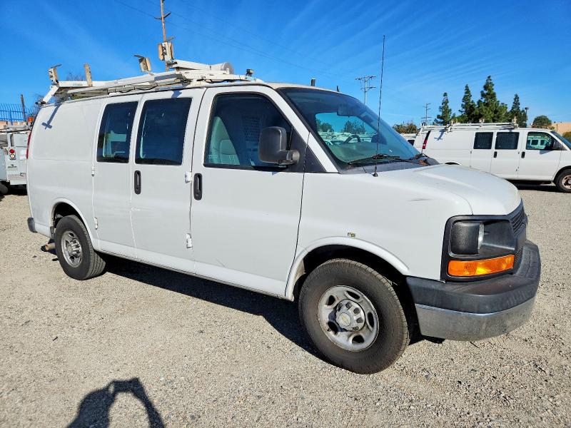 2014 Chevrolet Express VIN 1GCWGFCB7E1120286 COPART salvage auction — NORMAL WEAR, CA - DIS/DLR/EXP ONLY CLEAN TITLE, sold $5,800 on 2026-07-21 (photo 4)