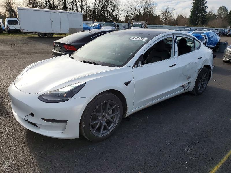 2023 Tesla Model 3 VIN 5YJ3E1EA1PF455988 COPART salvage auction — SIDE, OR - LIEN PAPERS SALVAGE, sold $6,700 on 2026-07-20 (photo 1)
