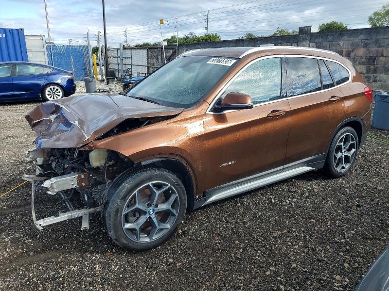 2017 BMW X1 VIN WBXHT3C33H5F82651 — COPART salvage auction photo