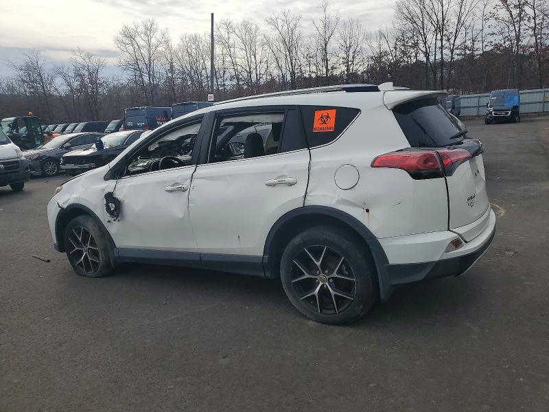 2018 Toyota Rav4 VIN JTMJFREV6JD238893 COPART salvage auction — ROLLOVER, In - Certificate Of Title, sold $2,700 on 2026-07-07 (photo 2)