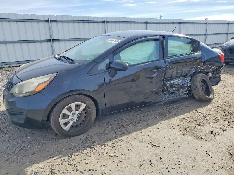2014 Kia Rio VIN KNADM4A31E6340295 COPART salvage auction — SIDE, Id - Salvage Certificate Of Title, sold $500 on 2026-07-08 (photo 1)