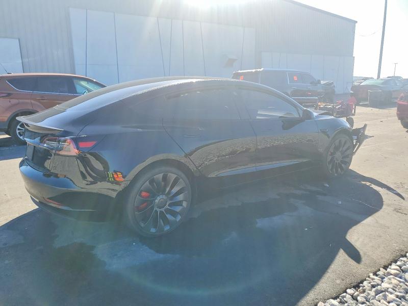 2022 Tesla Model 3 VIN 5YJ3E1EC6NF195974 COPART salvage auction — FRONT END, Fl - Cert Of Title Slvg Rebuildable, sold $10,400 on 2026-07-20 (photo 3)