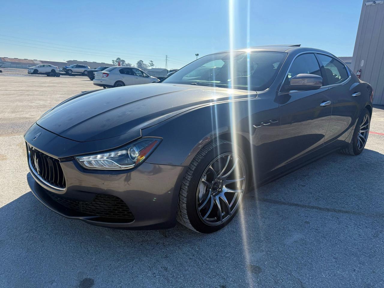 2017 Maserati Ghibli VIN ZAM57XSA9H1206127 COPART salvage auction — Damage History, TX - CERT OF TITLE-REBUILT SALVAGE (P), sold $30,500 on 2026-02-27 (photo 2)
