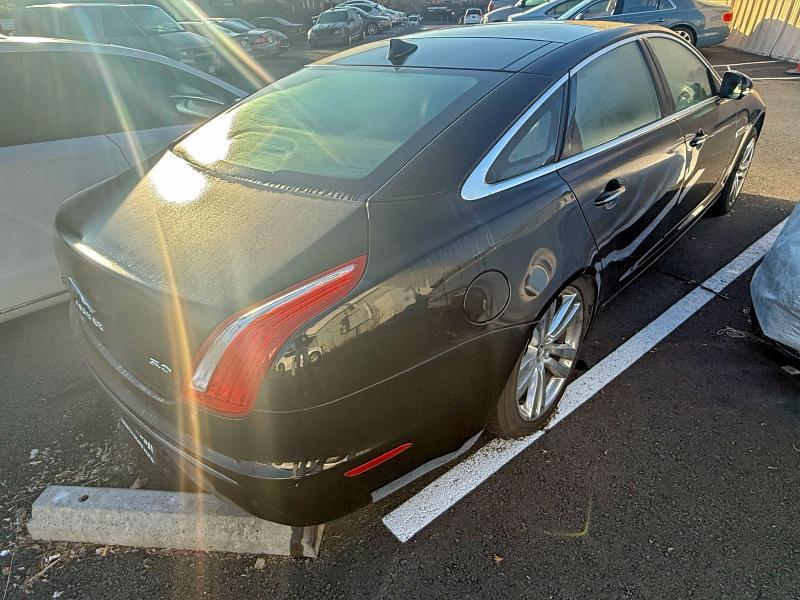 2013 Jaguar Xj series VIN SAJWA2GB2DLV42961 COPART salvage auction — NORMAL WEAR, Ca - Dis/Dlr/Exp Only Clean Title (P), sold $1,000 on 2026-07-20 (photo 4)