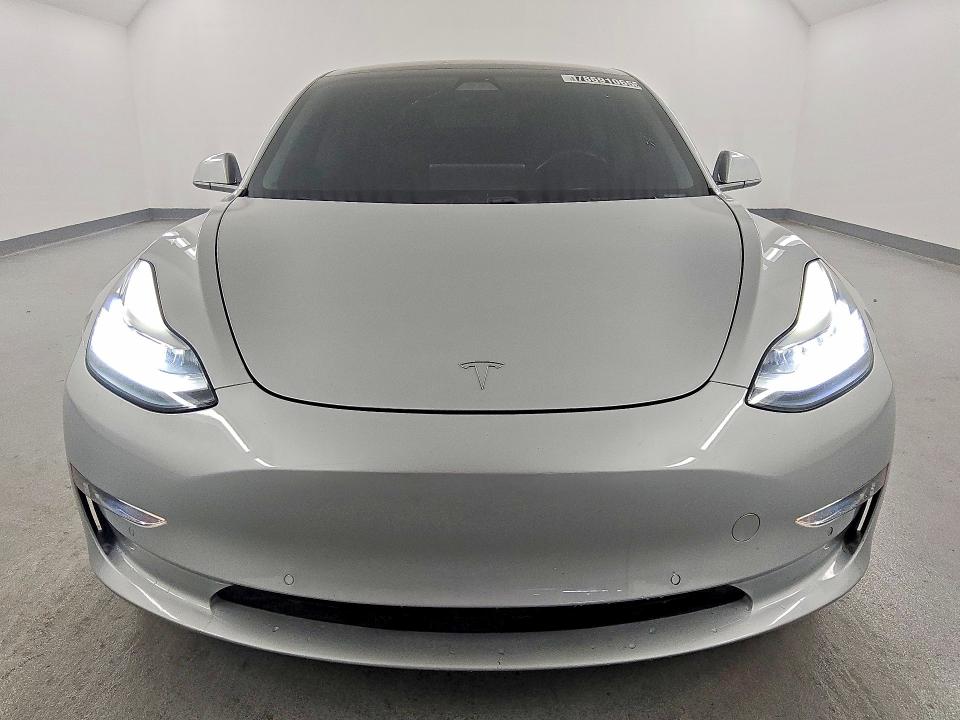 2018 Tesla Model 3 VIN 5YJ3E1EA6JF003476 COPART salvage auction — NORMAL WEAR, CA - DIS/DLR/EXP ONLY CLEAN TITLE (P), sold $14,400 on 2026-09-08 (photo 5)