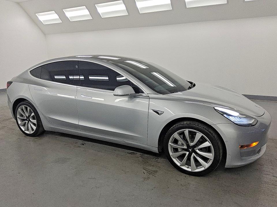 2018 Tesla Model 3 VIN 5YJ3E1EA6JF003476 COPART salvage auction — NORMAL WEAR, CA - DIS/DLR/EXP ONLY CLEAN TITLE (P), sold $14,400 on 2026-09-08 (photo 4)