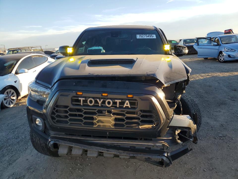 2023 Toyota Tacoma VIN 3TMCZ5ANXPM566023 COPART salvage auction — FRONT END, Ca - Salvage Certificate, sold $9,100 on 2026-07-31 (photo 5)