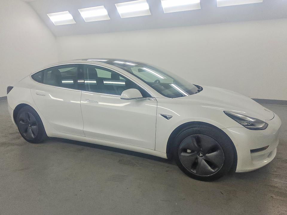 2020 Tesla Model 3 VIN 5YJ3E1EA1LF633439 COPART salvage auction — NORMAL WEAR, CA - CERTIFICATE OF TITLE, sold $11,500 on 2026-09-01 (photo 4)
