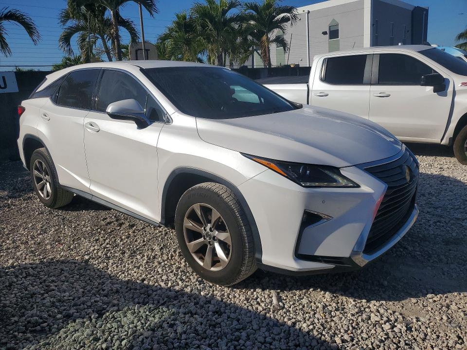 2019 Lexus Rx VIN 2T2ZZMCA4KC140386 COPART salvage auction — Rear End, FL - CERT OF TITLE W/SLVG HISTORY (P), sold $20,900 on 2026-03-20 (photo 4)