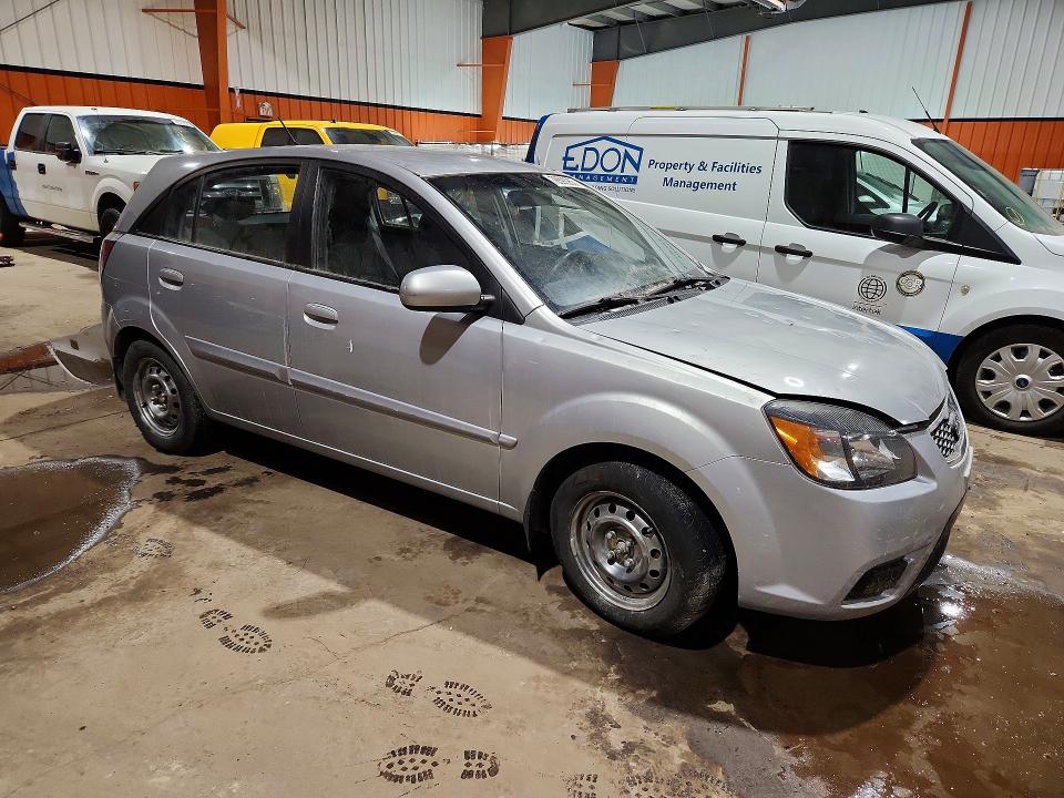 2011 Kia Rio VIN KNADH5B39B6756700 COPART salvage auction — VANDALISM, AB - BOS - SALVAGE, sold $450 on 2026-07-14 (photo 4)