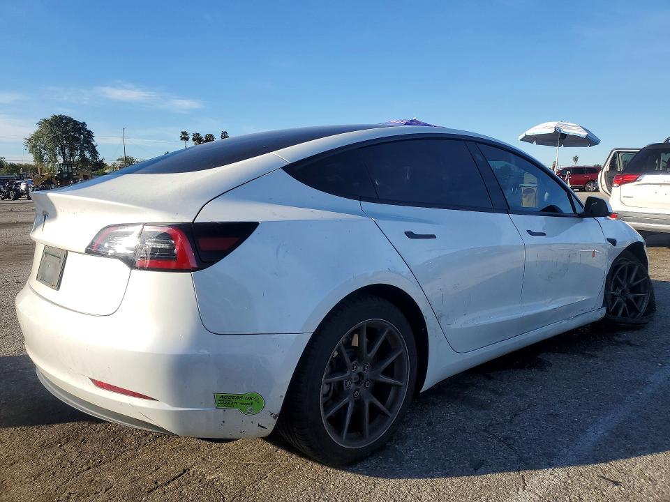 2023 Tesla Model 3 VIN 5YJ3E1EA0PF400870 COPART salvage auction — SIDE, CA - SALVAGE CERTIFICATE, sold $5,800 on 2026-07-31 (photo 3)